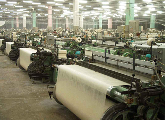Textile looms and fabric on a production floor